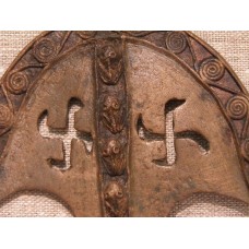 Bronze pendant, pre-Christian with rounded swastika, cross